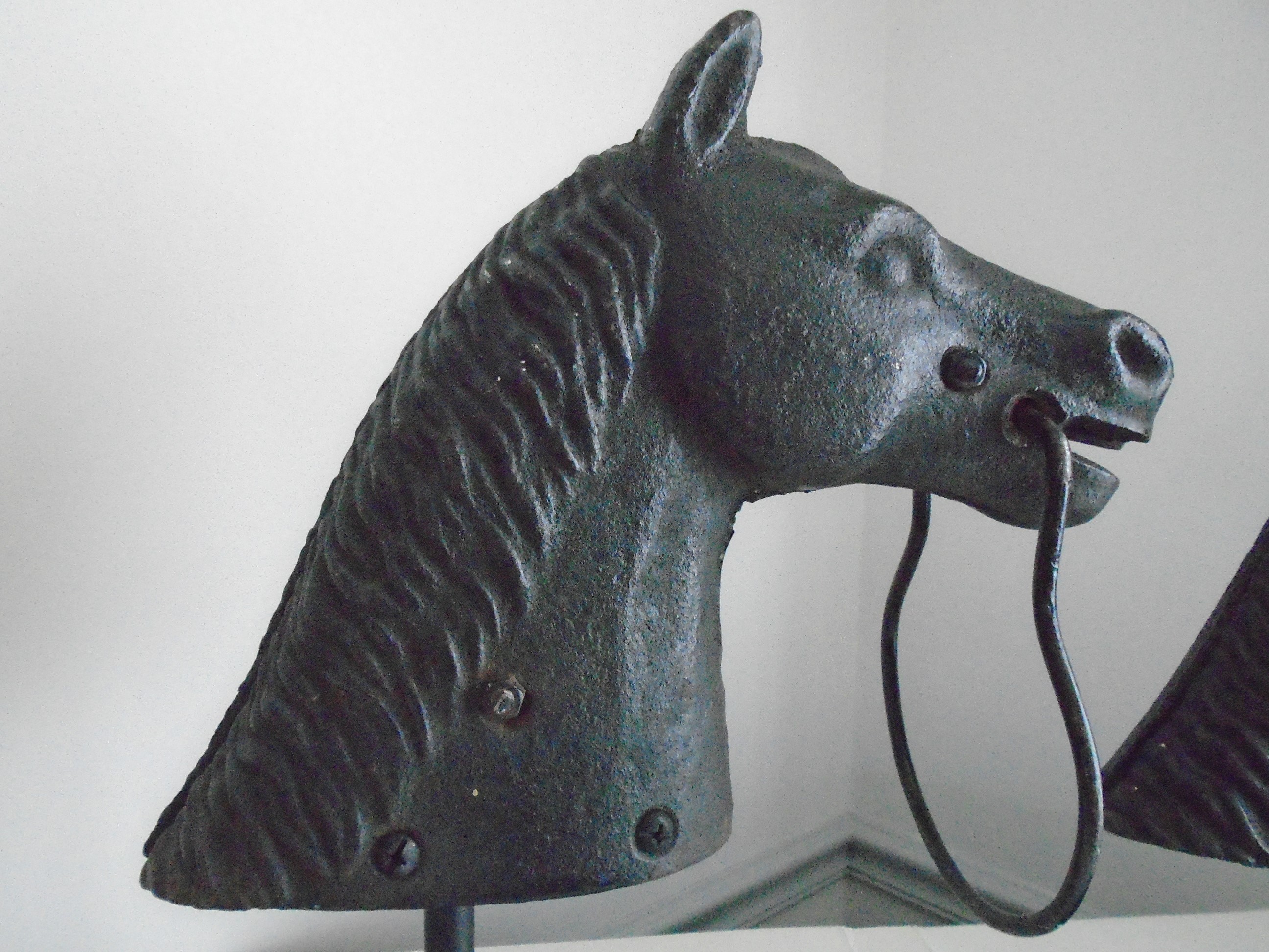 PAIR OF HORSE HEAD HITCHING POST